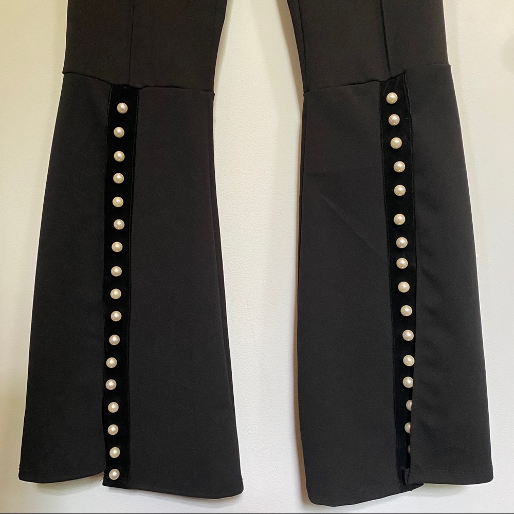 Black bell bottoms with pearl detail